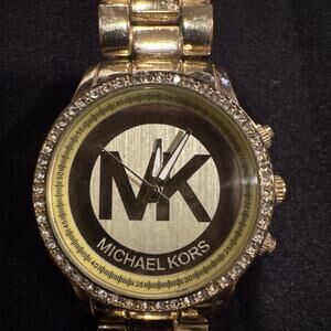 Michael Kors Parker gold-tone with a crystal-set bezel